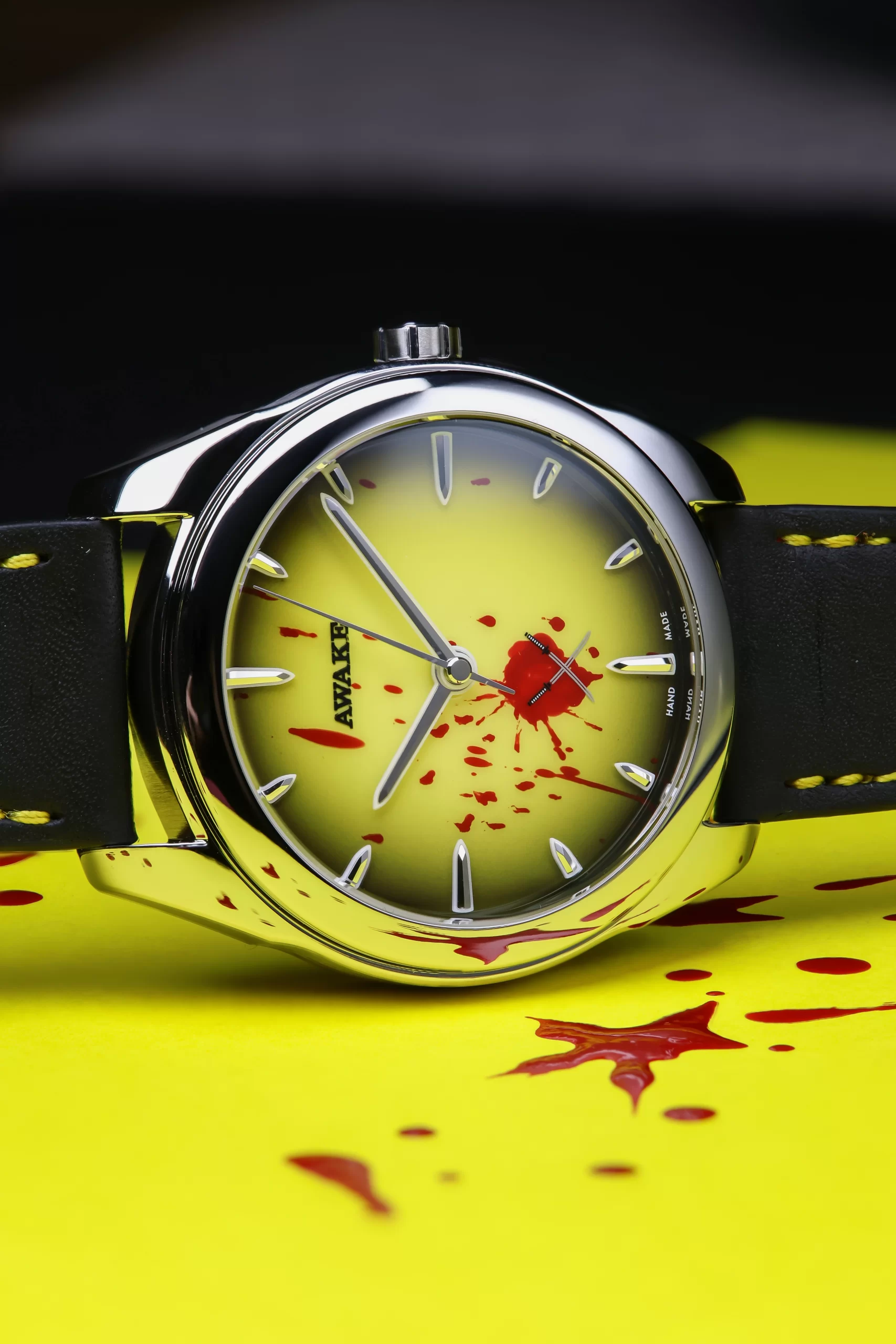 Red splatter on lacquer dial close-up
